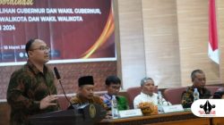 PODIUM: Pembukaan Rakor finalisasi infografis Pilkada Serentak 2024 di Kota Malang, menghadirkan perwakilan KPU dari berbagai daerah untuk meningkatkan transparansi pemilu. (Dok. Redaksi Parekas)